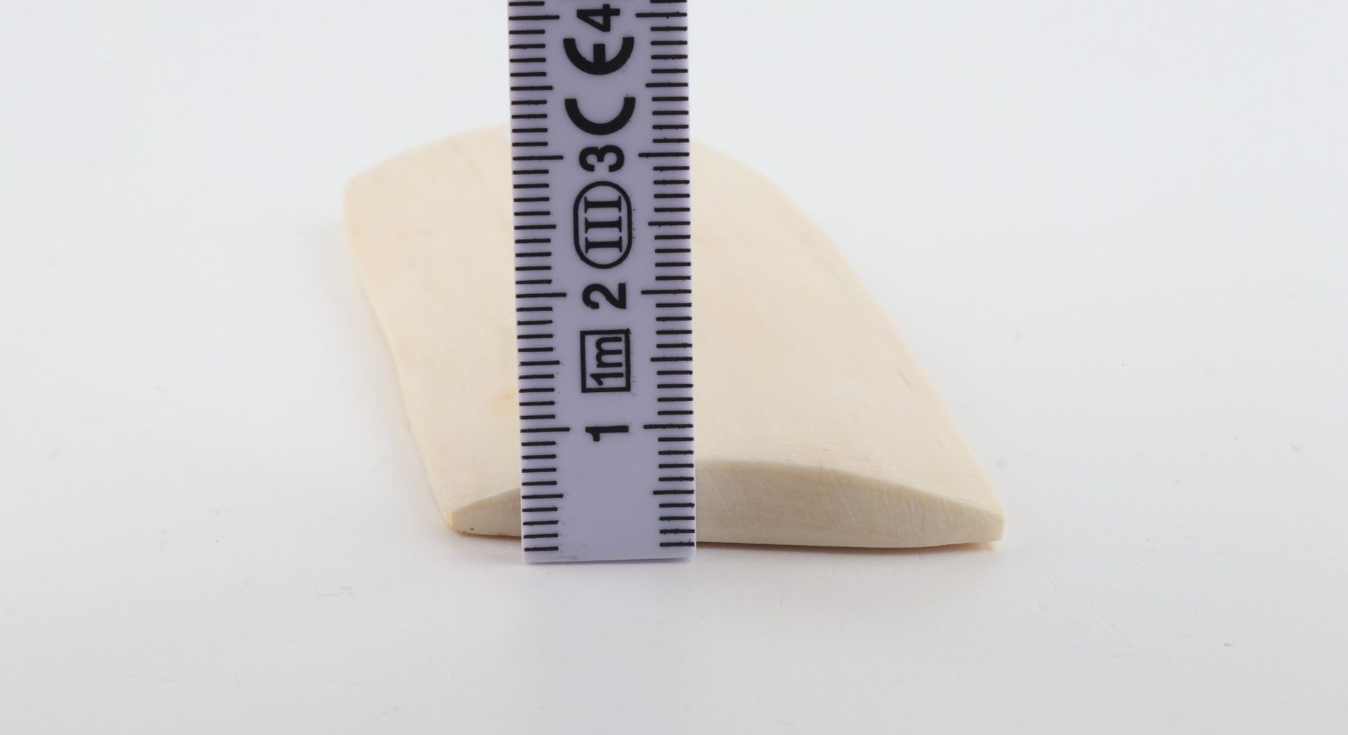 White mammoth ivory piece
