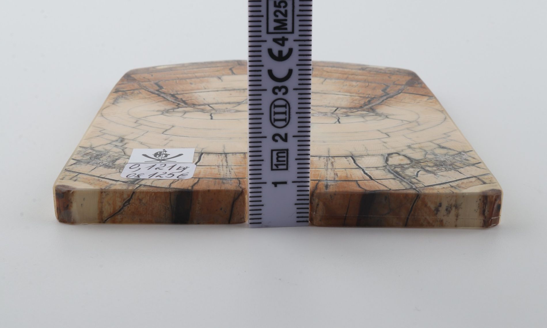 Stabilised mammoth ivory scales