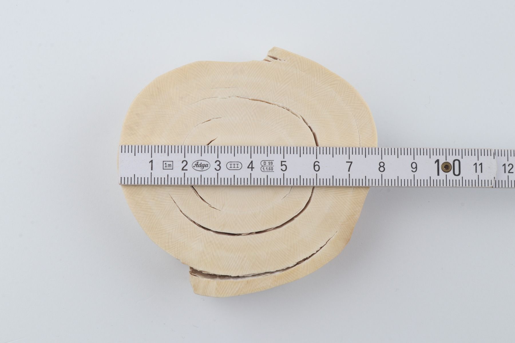 Round mammoth tusk piece