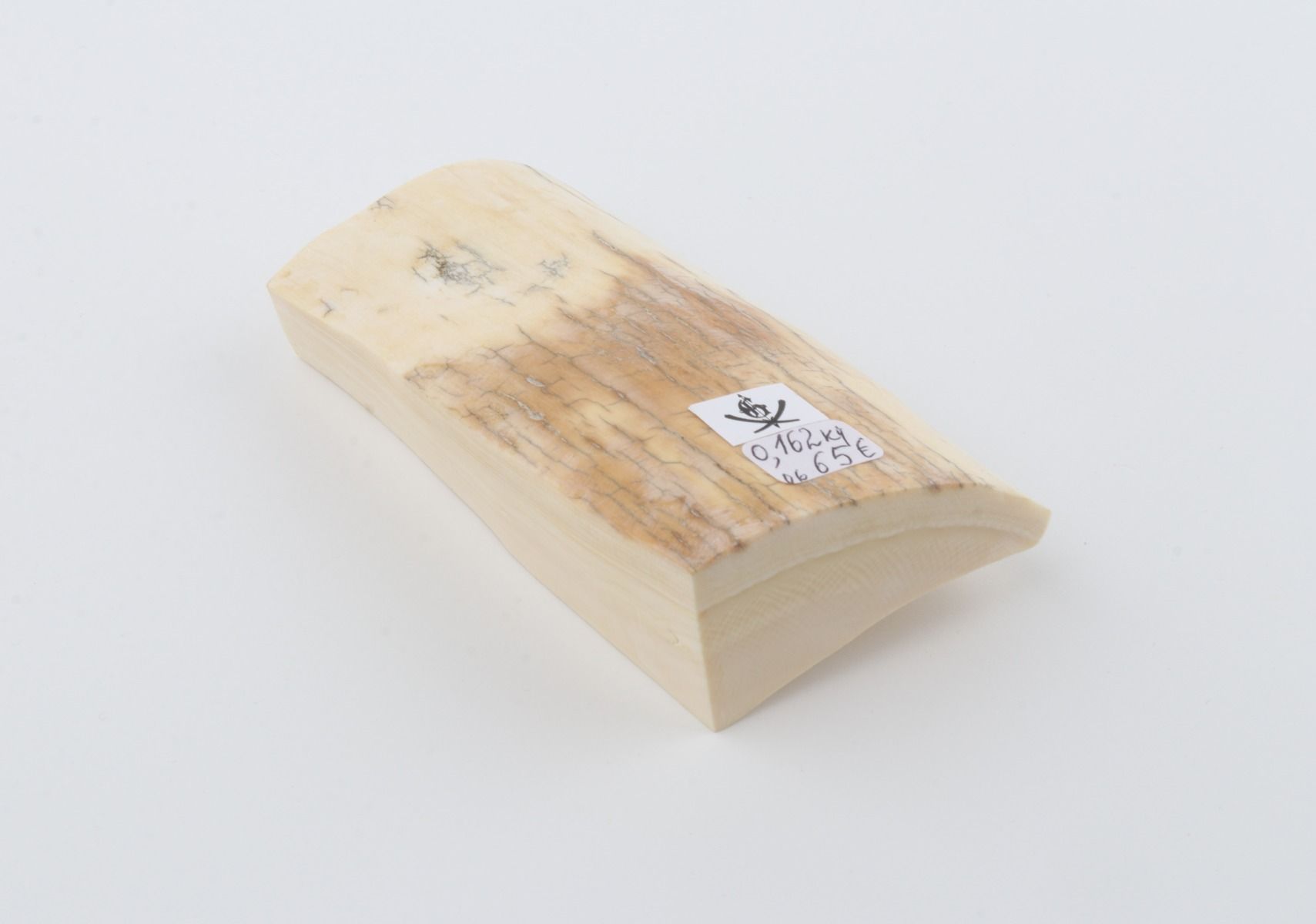 White mammoth ivory piece