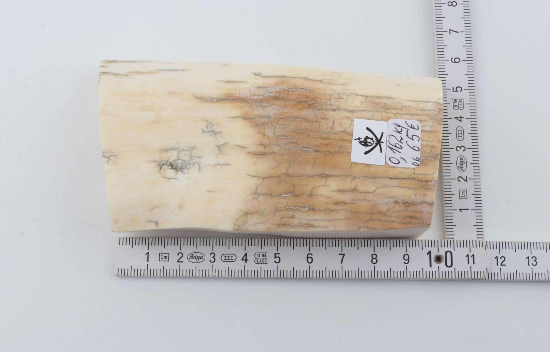 White mammoth ivory piece