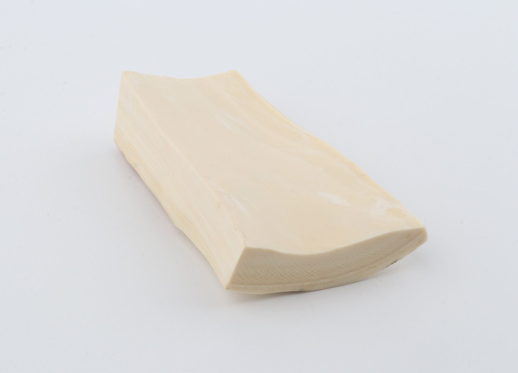 White mammoth ivory piece