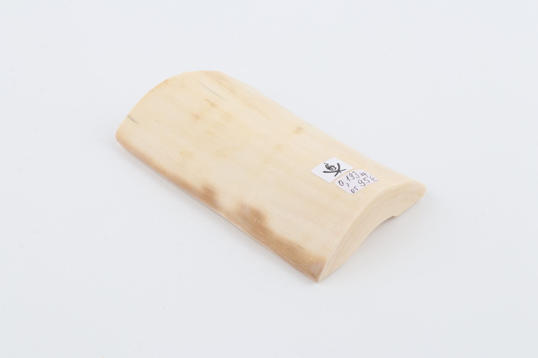 White mammoth ivory piece