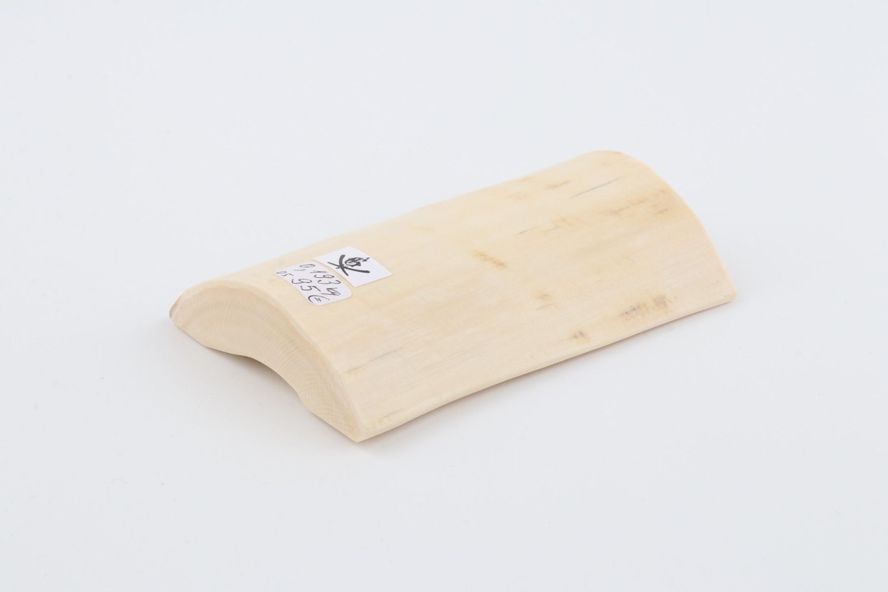 White mammoth ivory piece