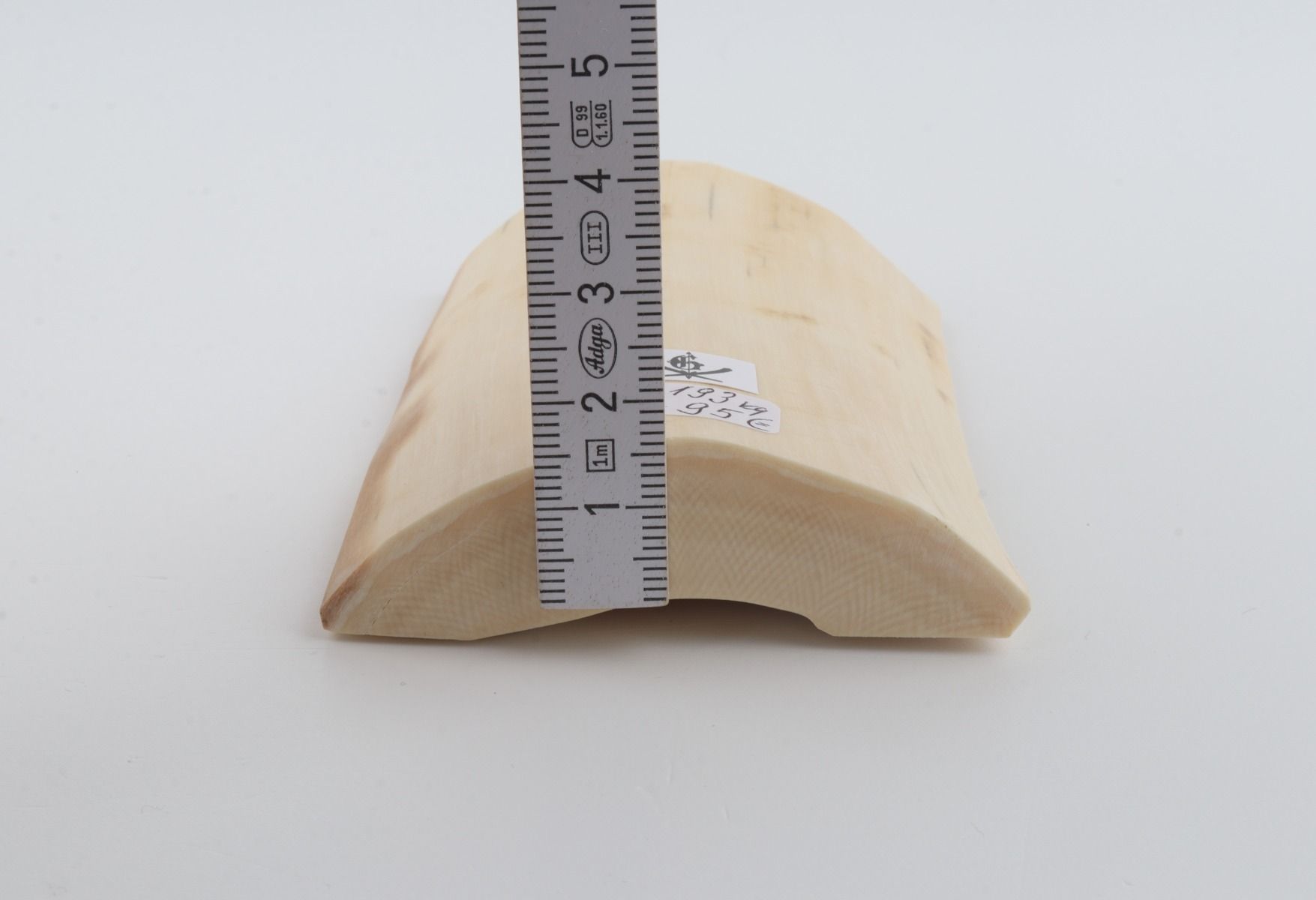 White mammoth ivory piece