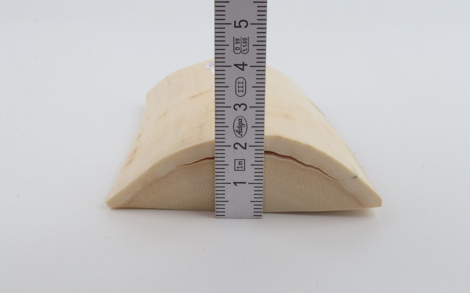White mammoth ivory piece