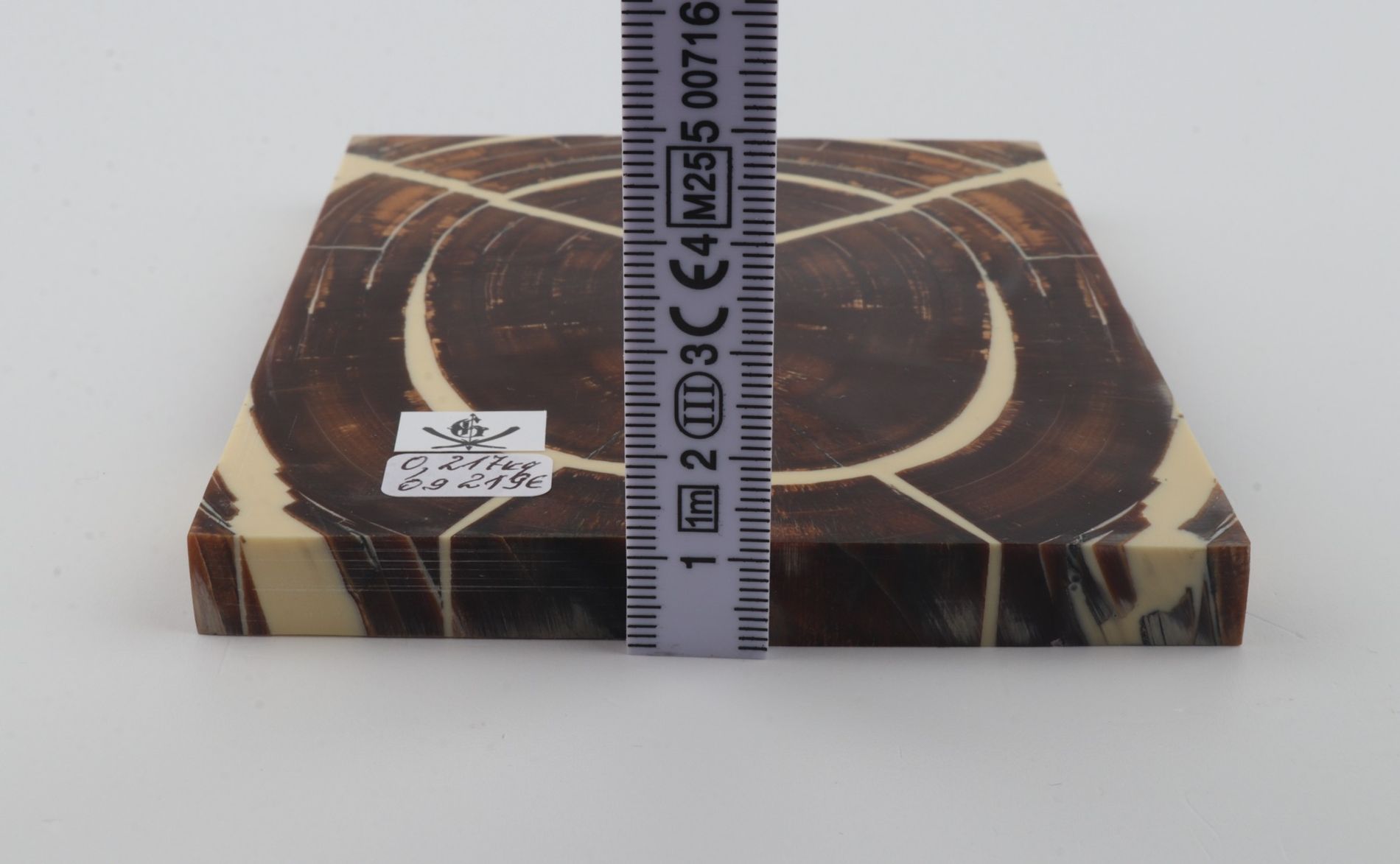 Stabilized mammoth ivory scales