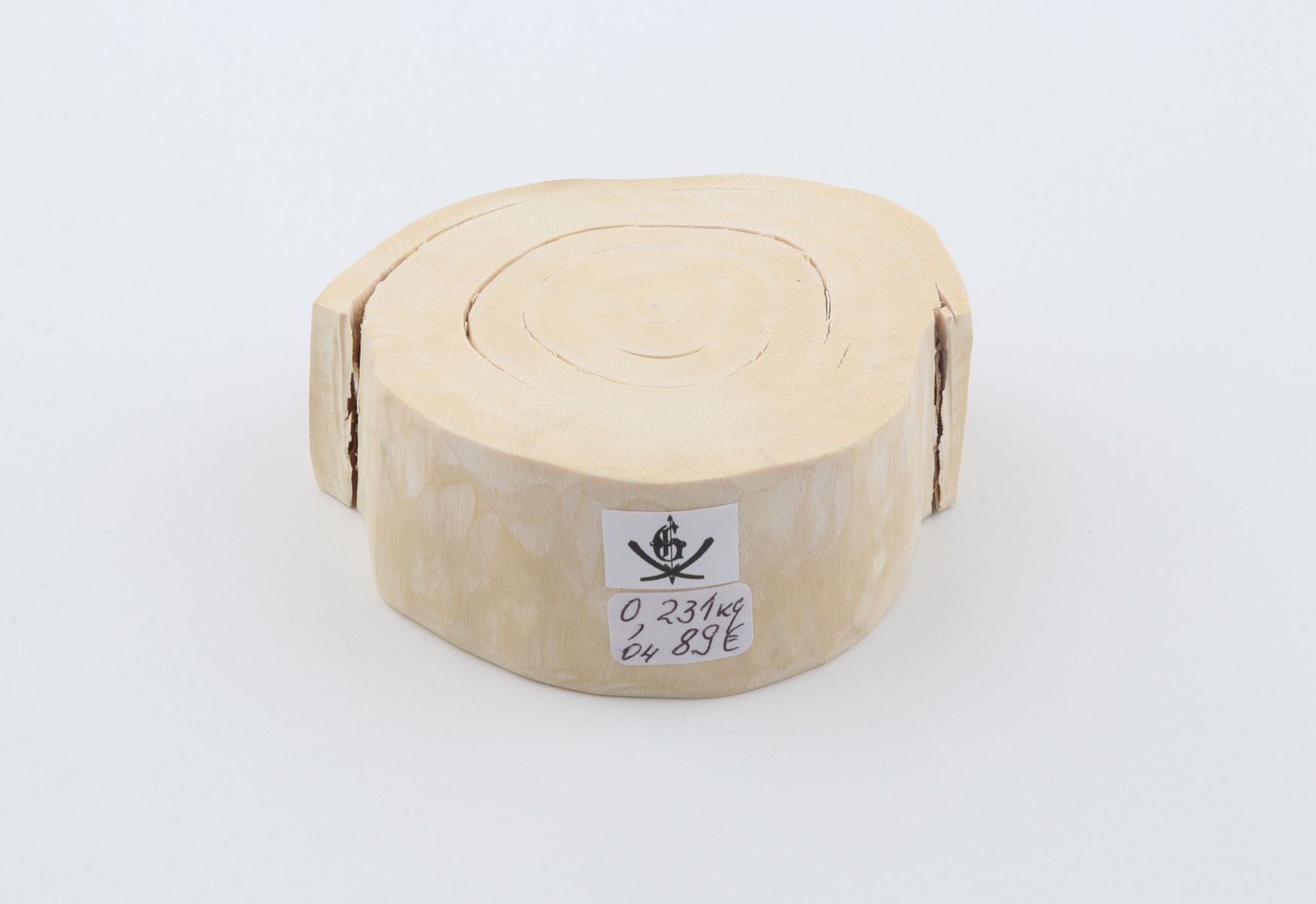 Round mammoth ivory piece