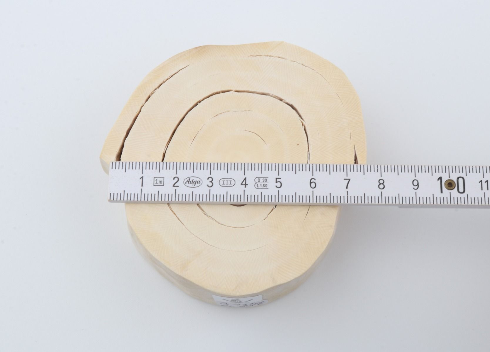 Round mammoth ivory piece