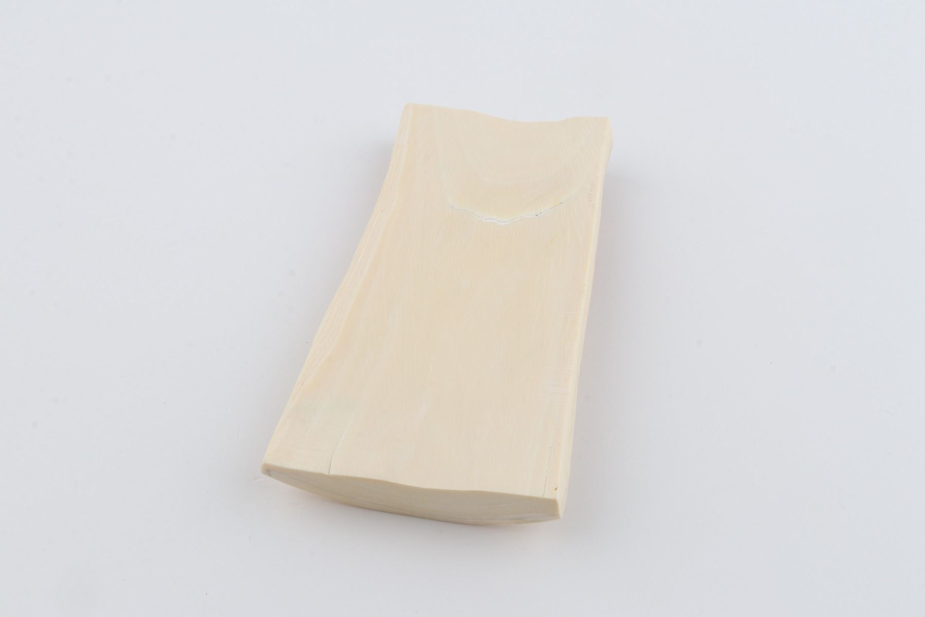 White mammoth ivory piece