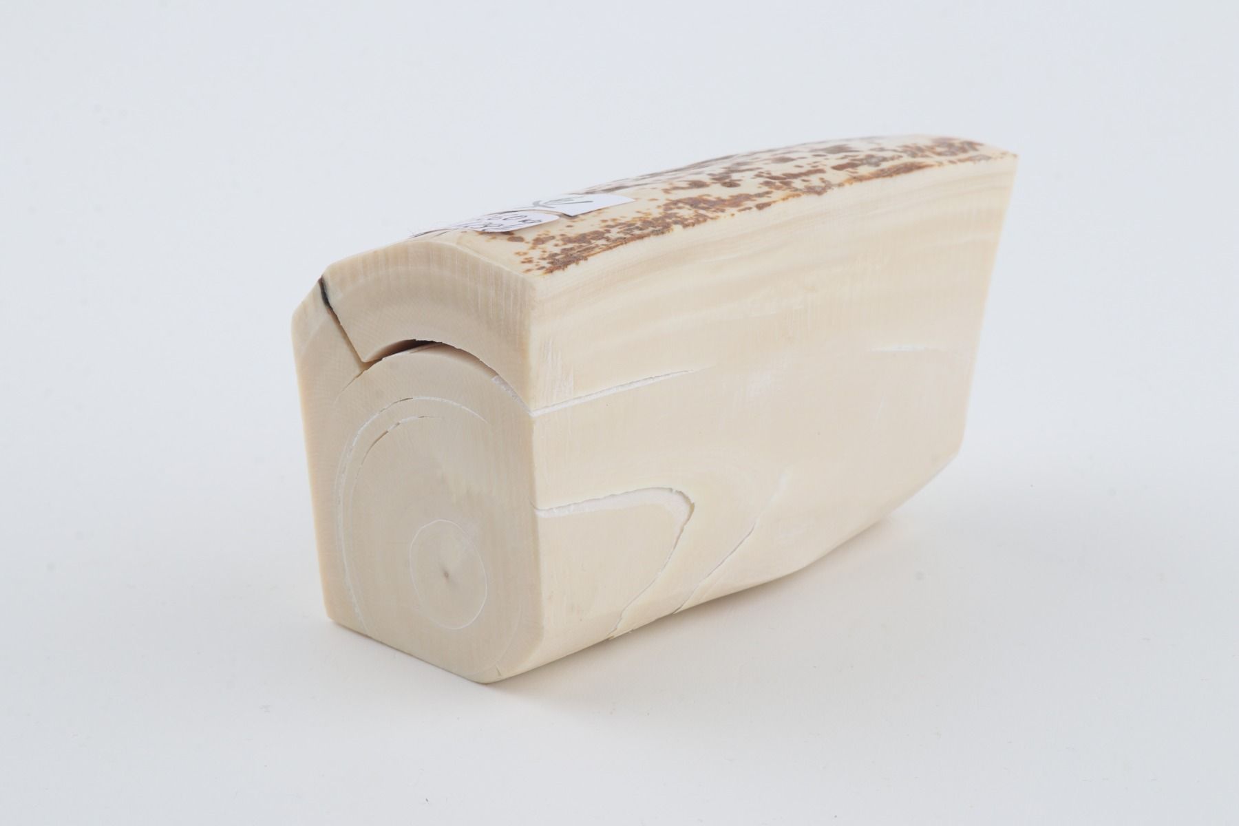 White mammoth ivory piece