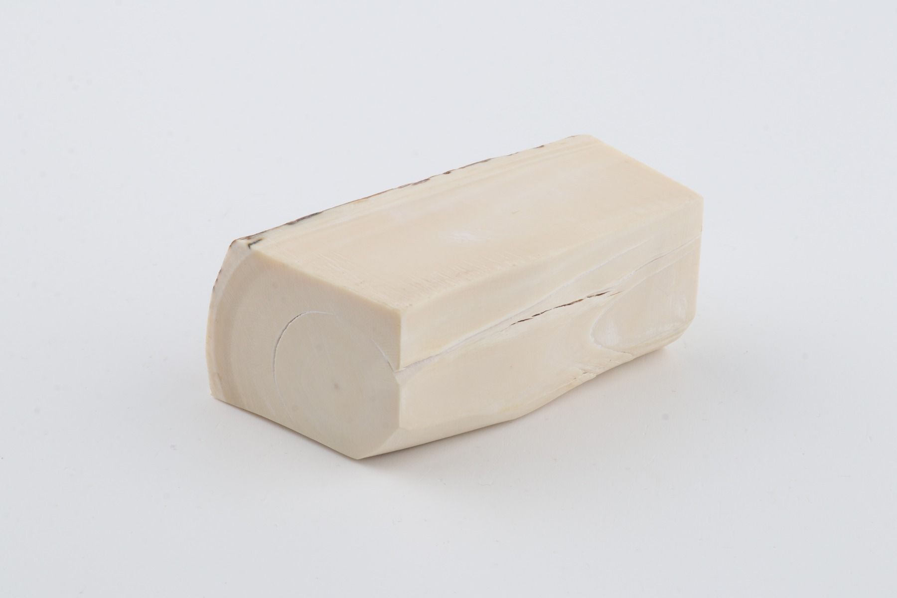 White mammoth ivory piece