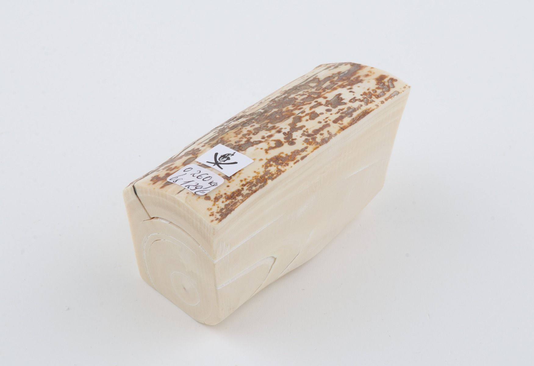 White mammoth ivory piece