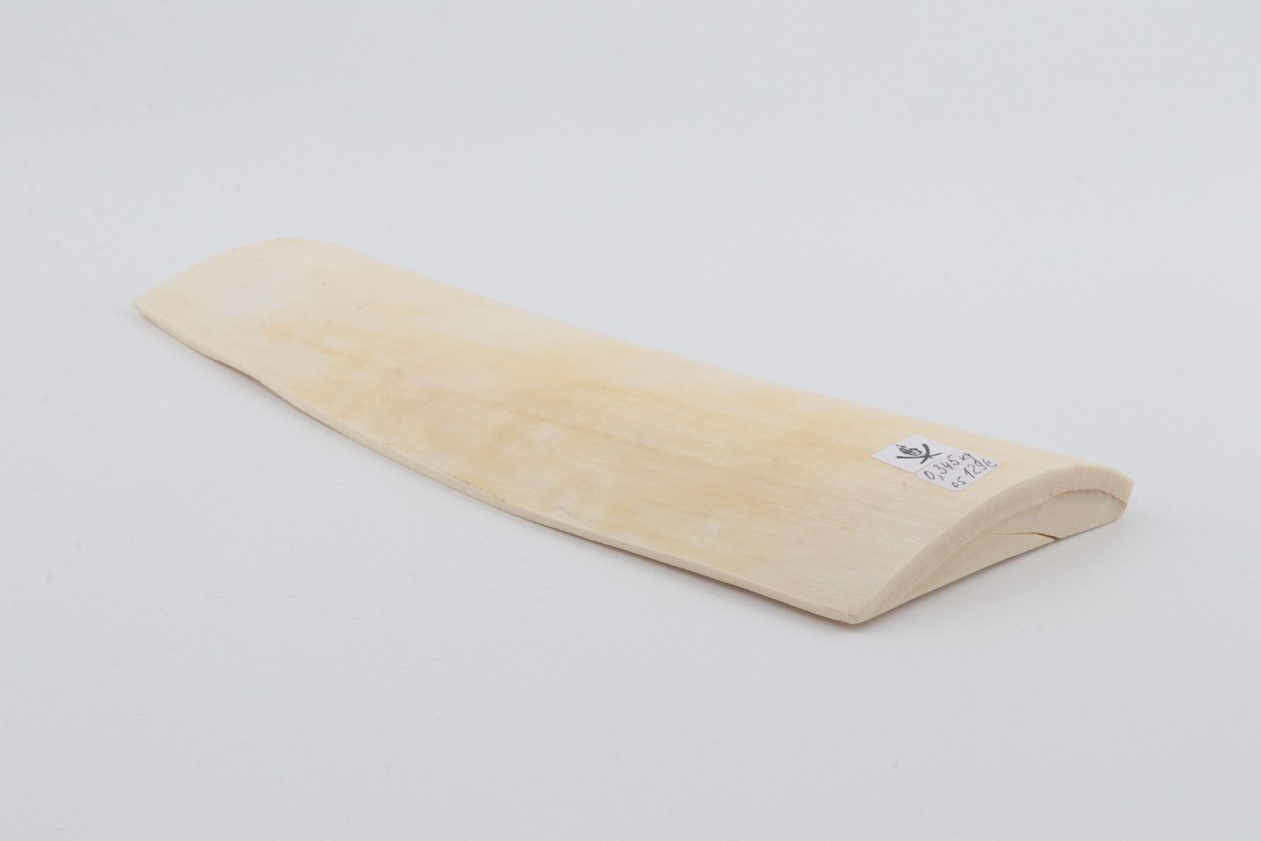White mammoth ivory piece