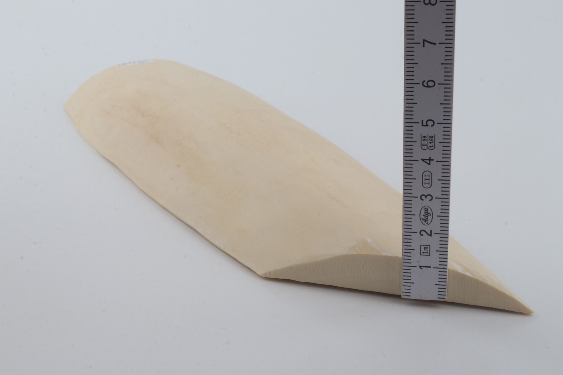White mammoth ivory piece