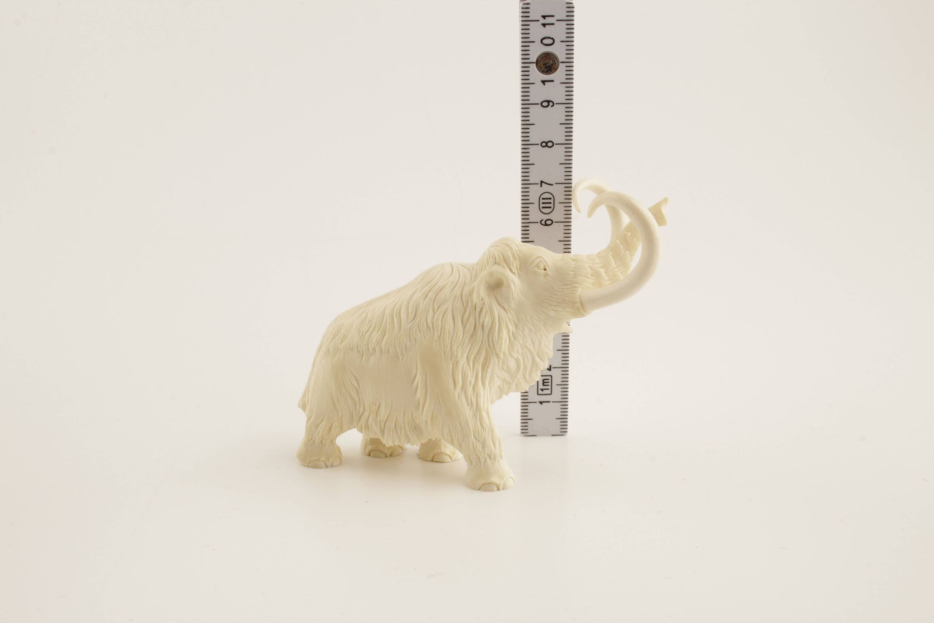 Carved woolly mammoth figurine