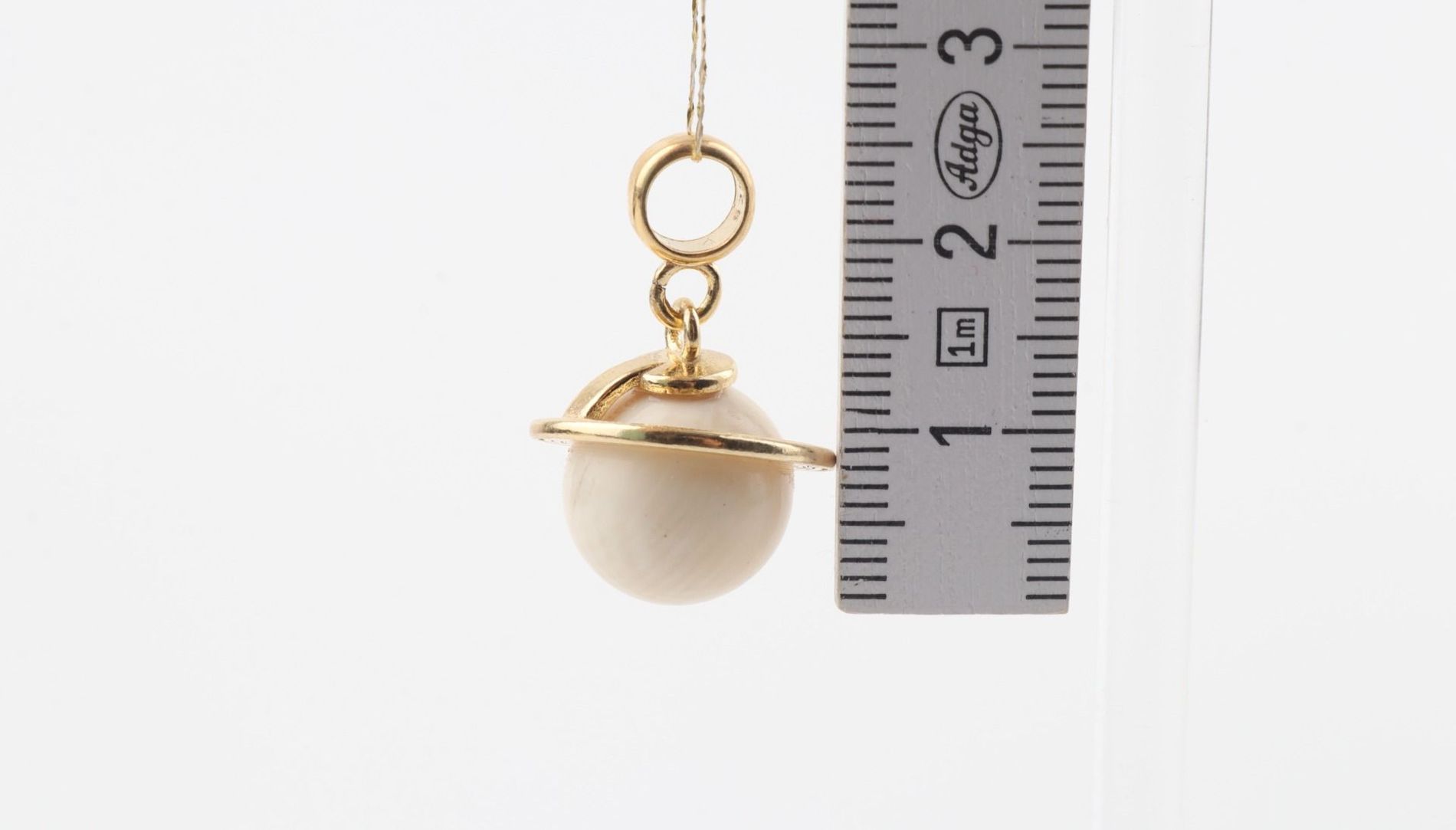 The Saturn Mammoth Ivory Pendant