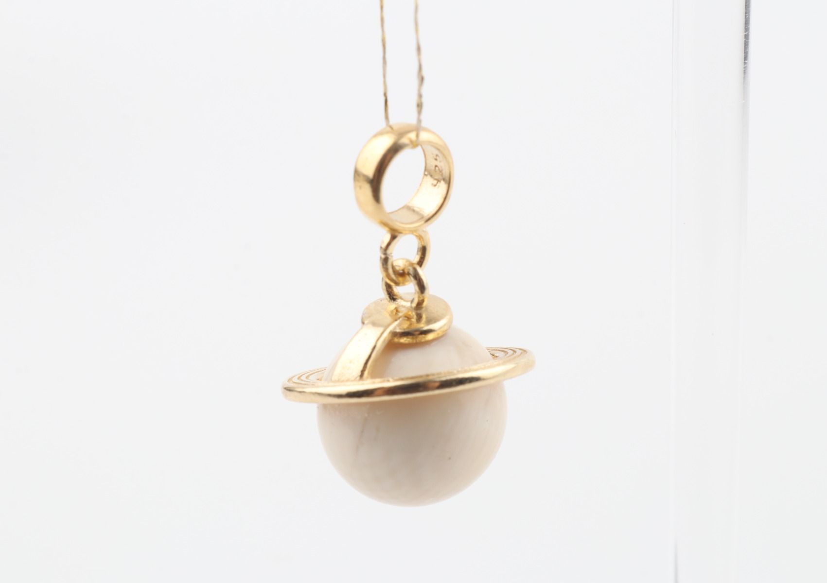 The Saturn Mammoth Ivory Pendant