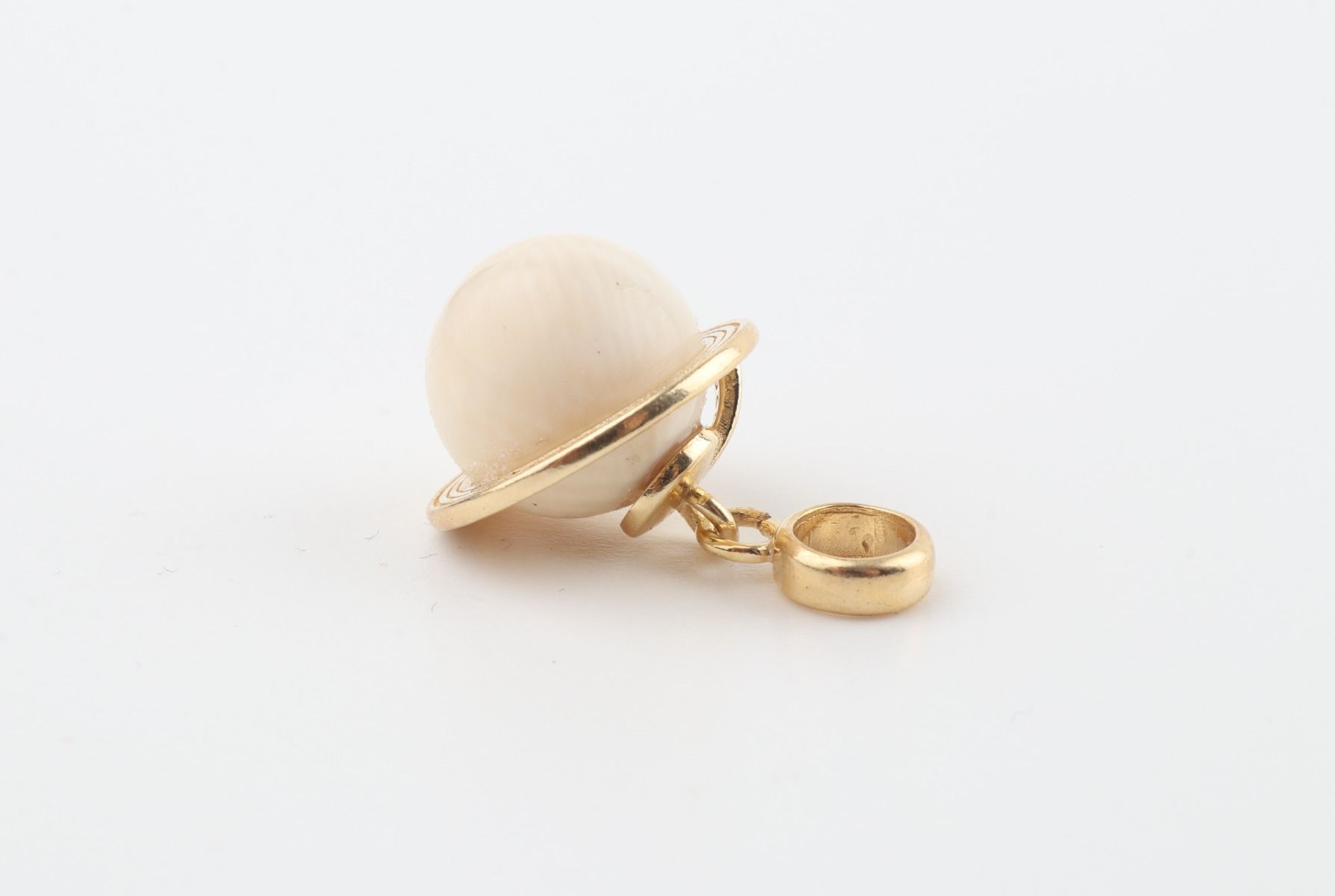 The Saturn Mammoth Ivory Pendant