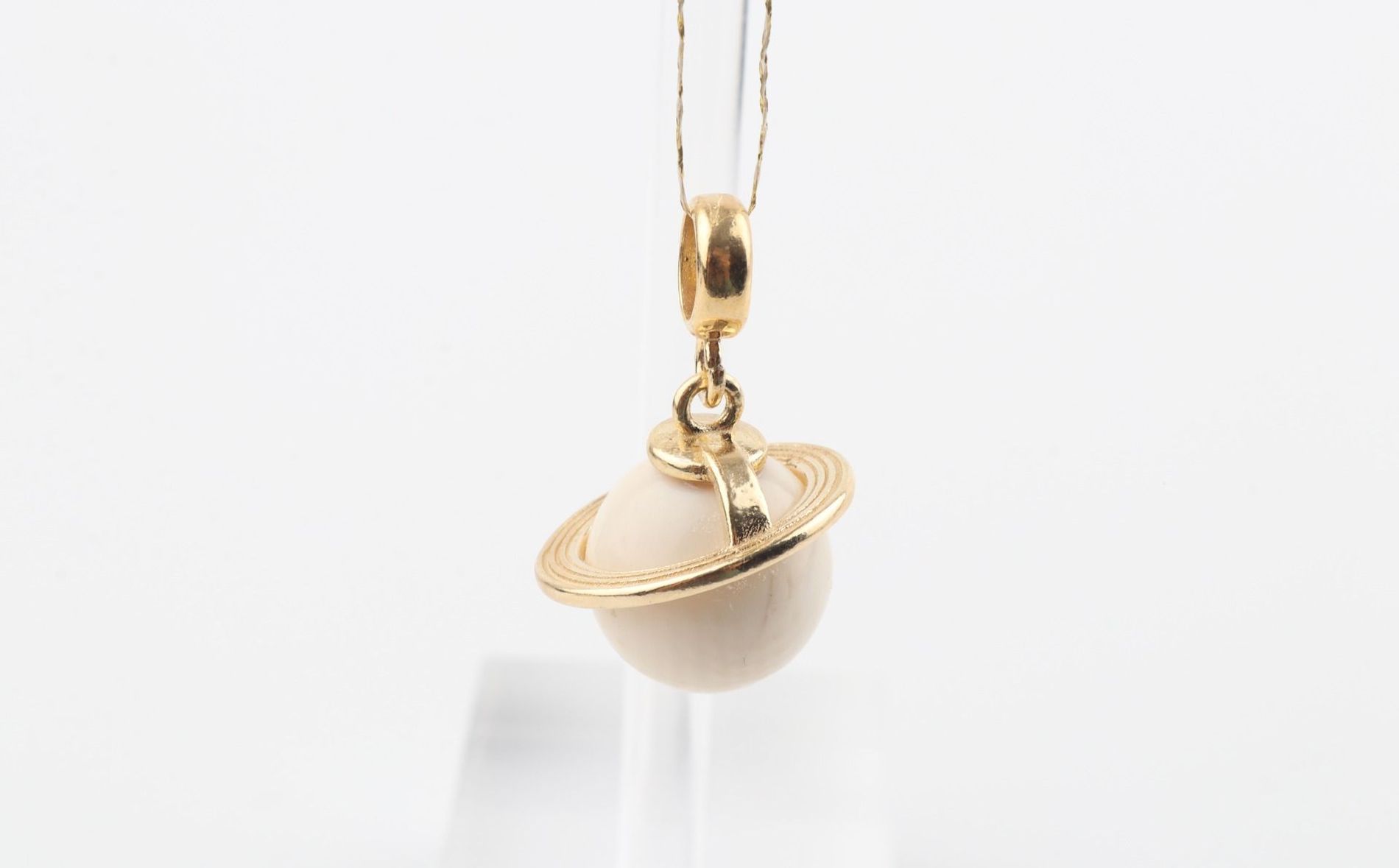 The Saturn Mammoth Ivory Pendant