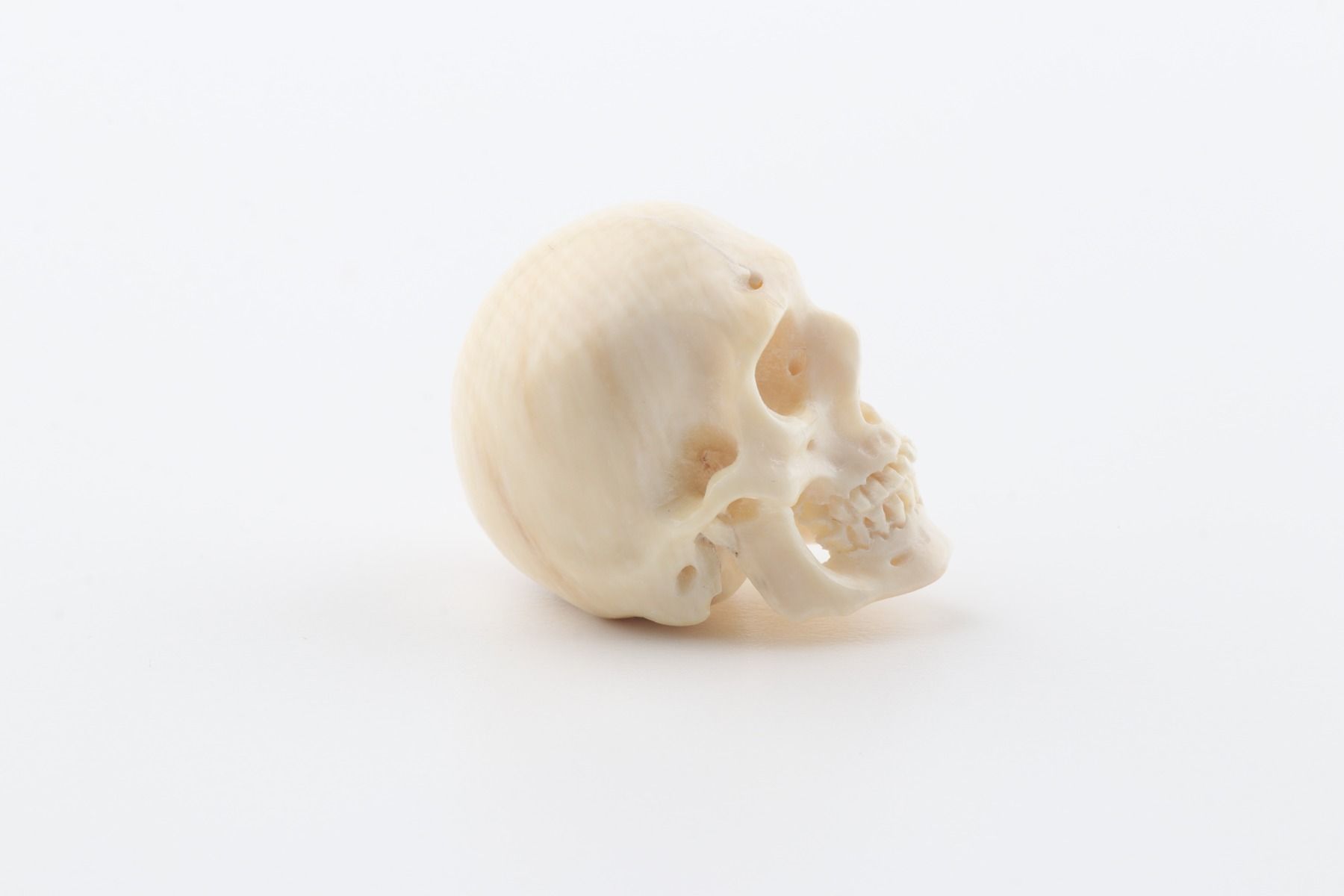 Hand carved mammoth ivory skull