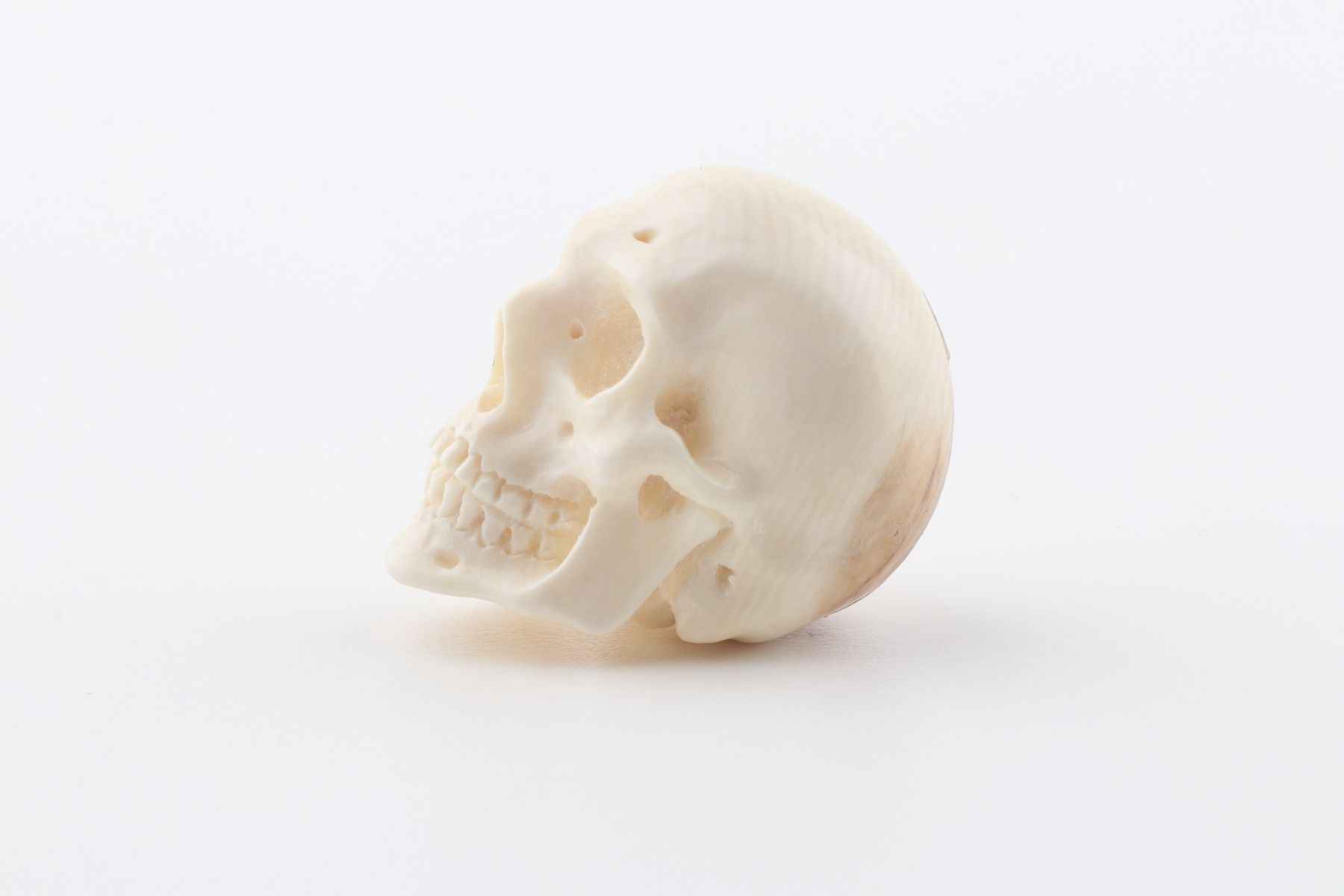 Hand carved mammoth ivory skull