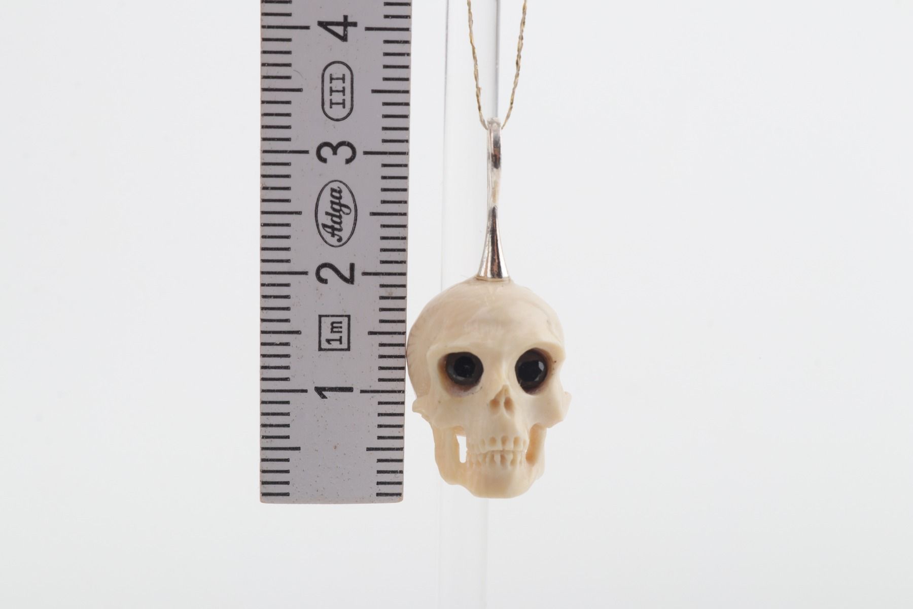 Festive Mammoth Ivory Skull Pendant 