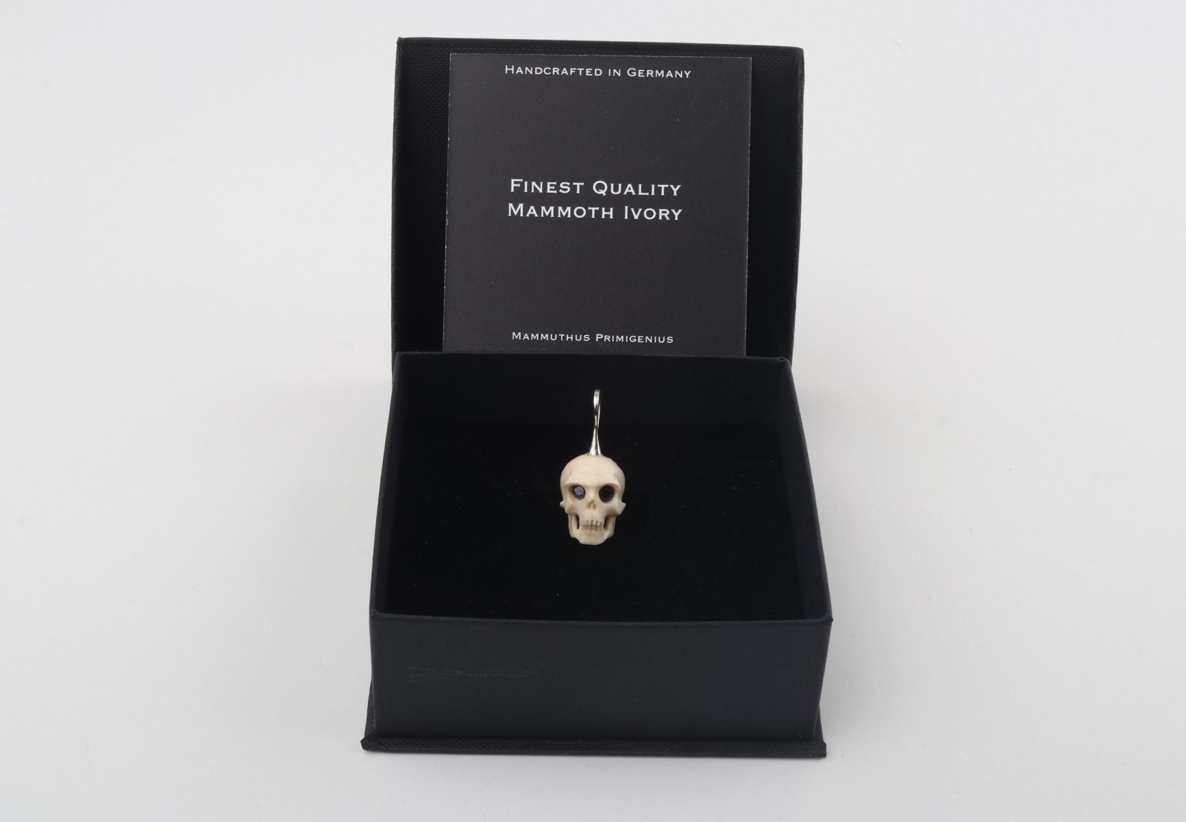 Festive Mammoth Ivory Skull Pendant 