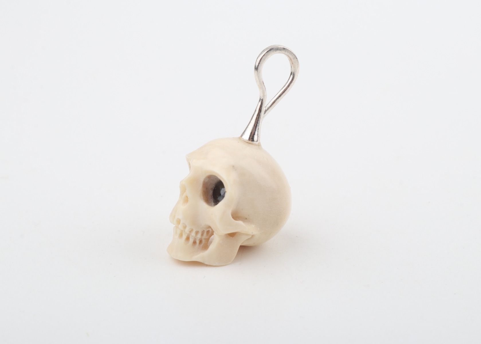Festive Mammoth Ivory Skull Pendant 