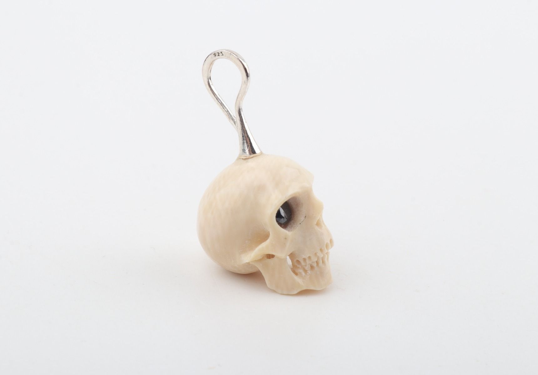 Festive Mammoth Ivory Skull Pendant 