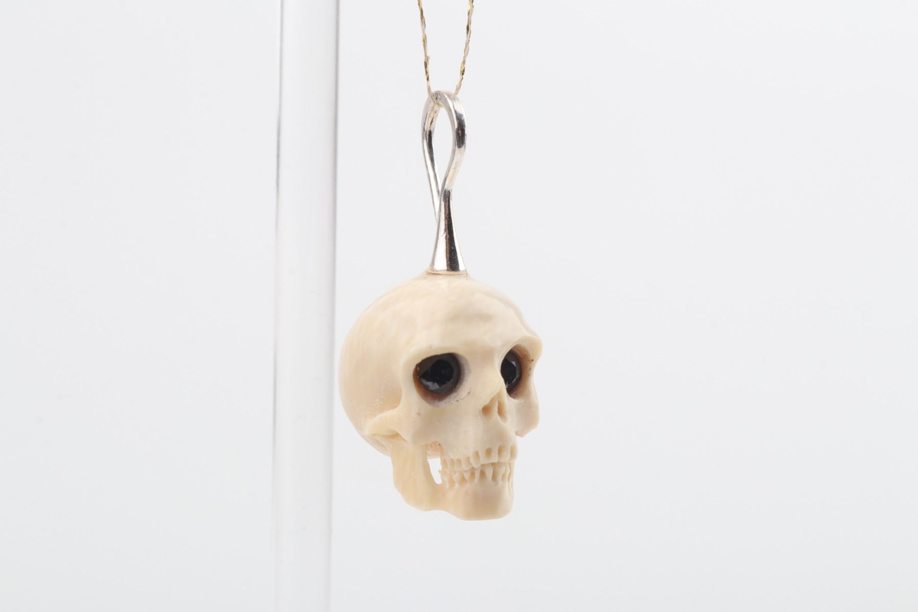 Festive Mammoth Ivory Skull Pendant 