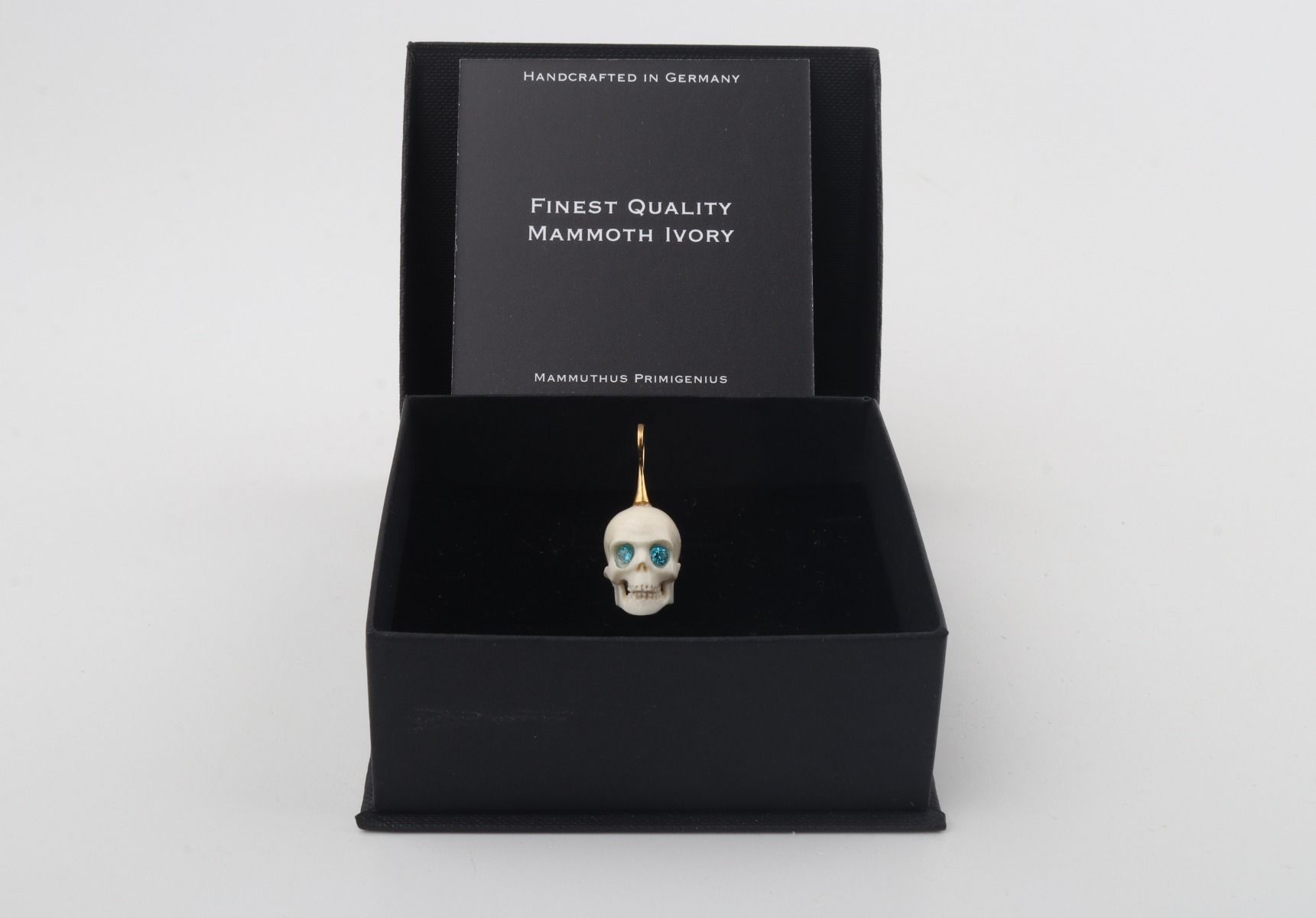 Festive Mammoth Ivory Skull Pendant 