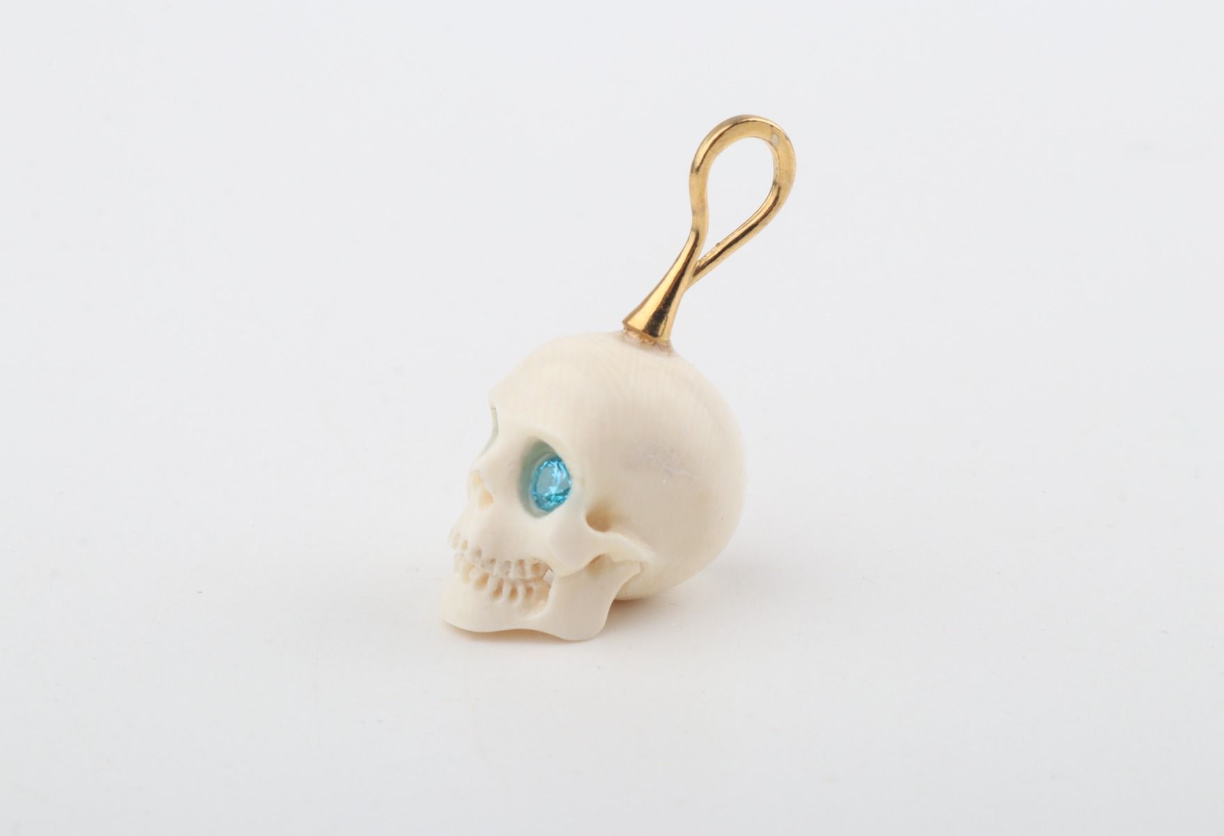 Festive Mammoth Ivory Skull Pendant 