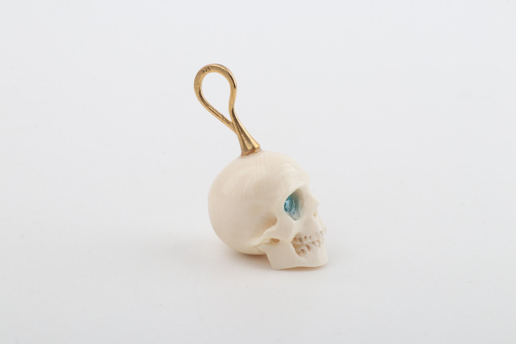 Festive Mammoth Ivory Skull Pendant 