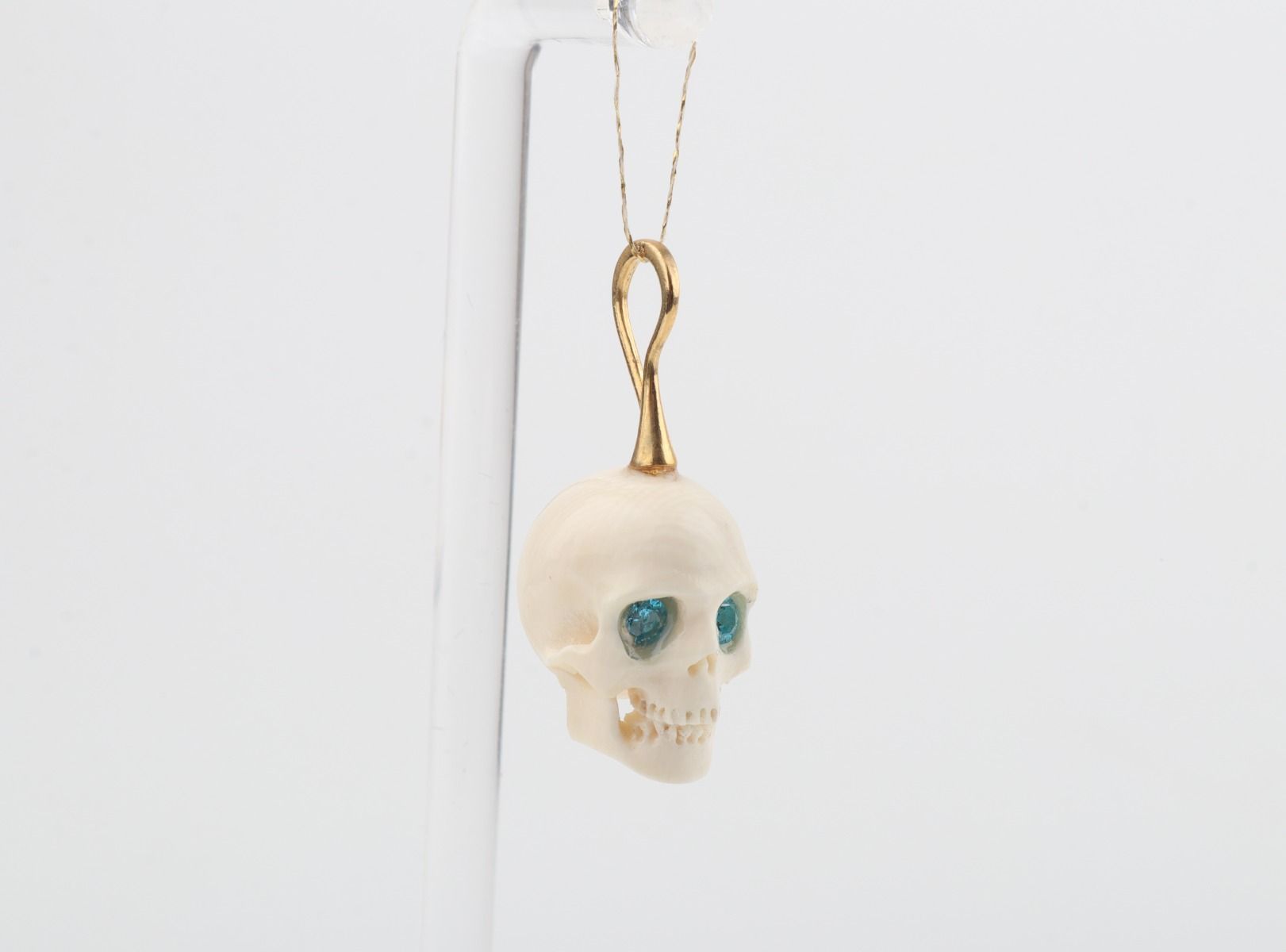 Festive Mammoth Ivory Skull Pendant 