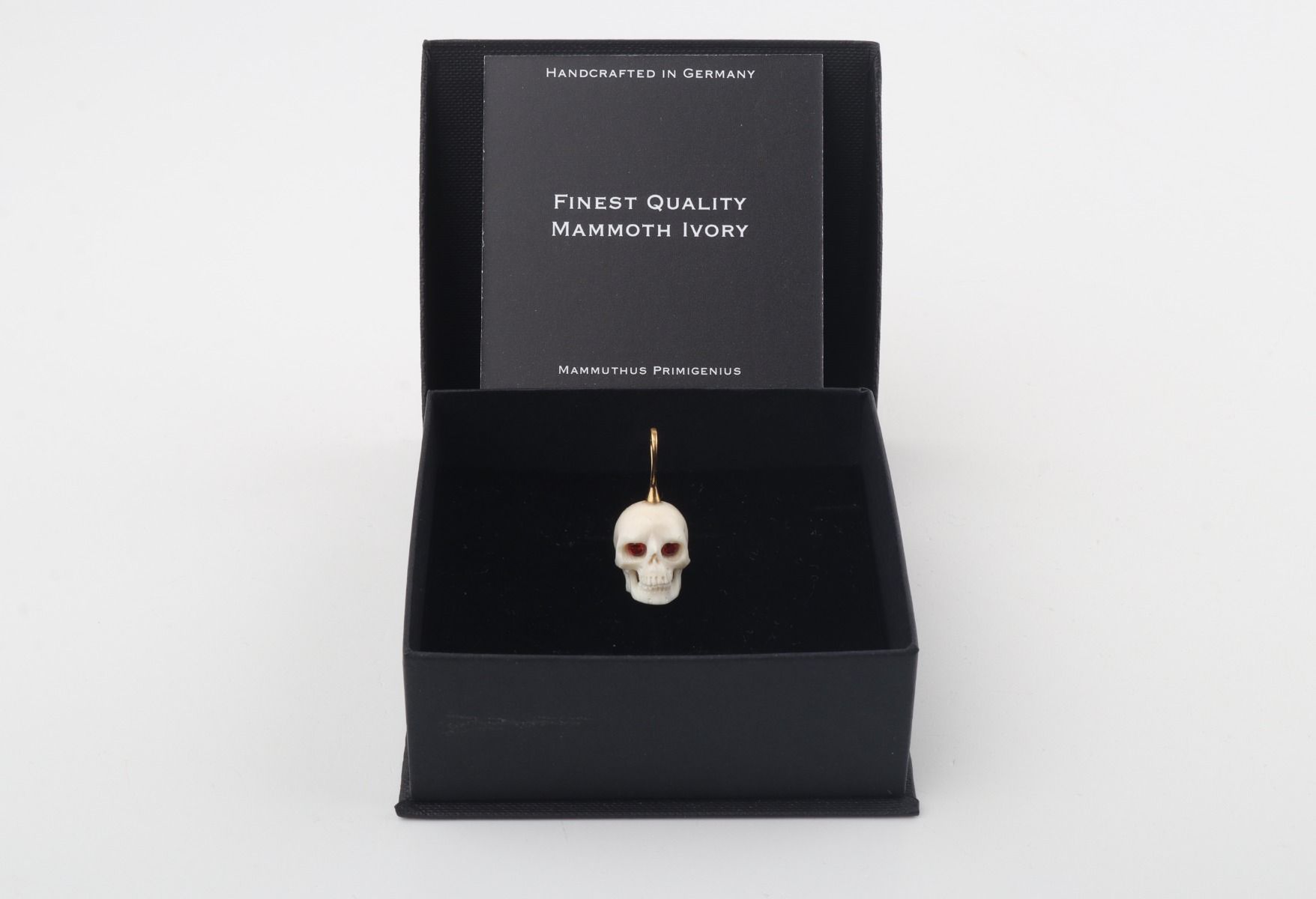 Festive Mammoth Ivory Skull Pendant