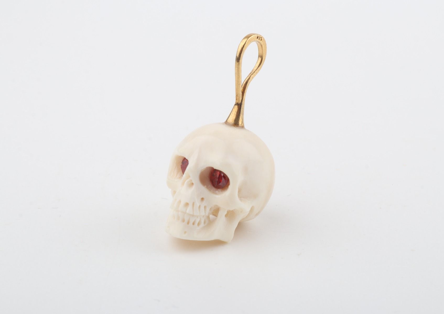 Festive Mammoth Ivory Skull Pendant
