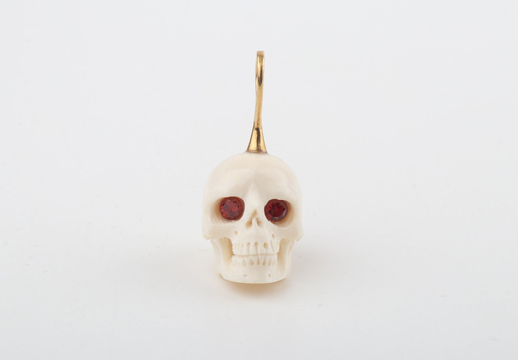 Festive Mammoth Ivory Skull Pendant