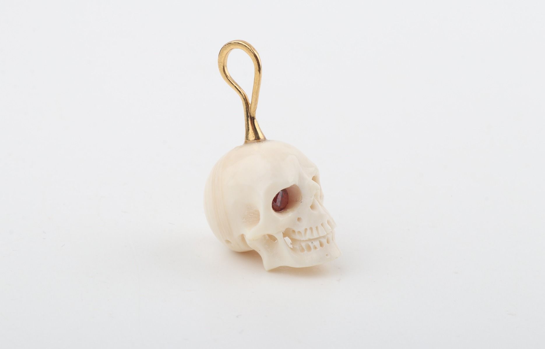 Festive Mammoth Ivory Skull Pendant