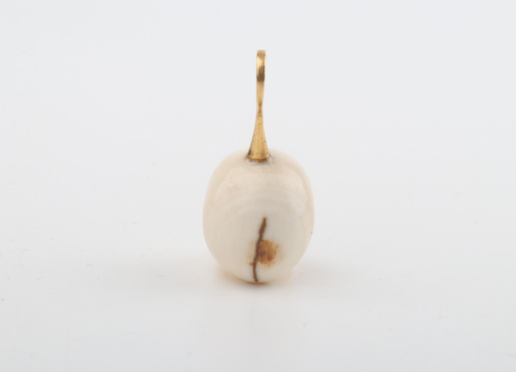 Festive Mammoth Ivory Skull Pendant