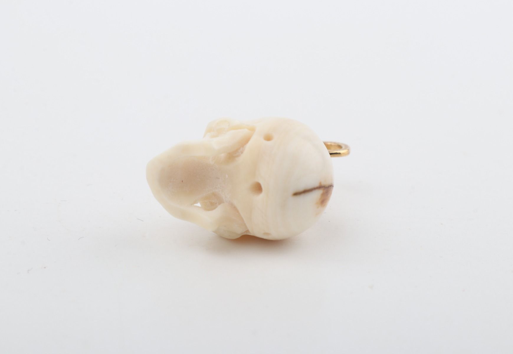 Festive Mammoth Ivory Skull Pendant