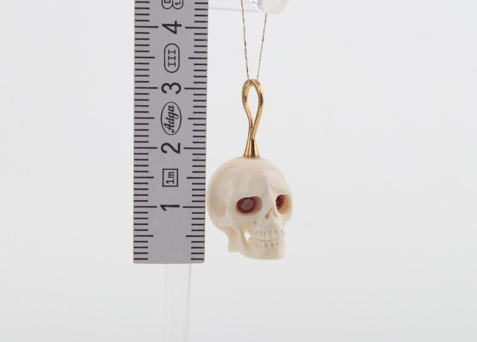 Festive Mammoth Ivory Skull Pendant