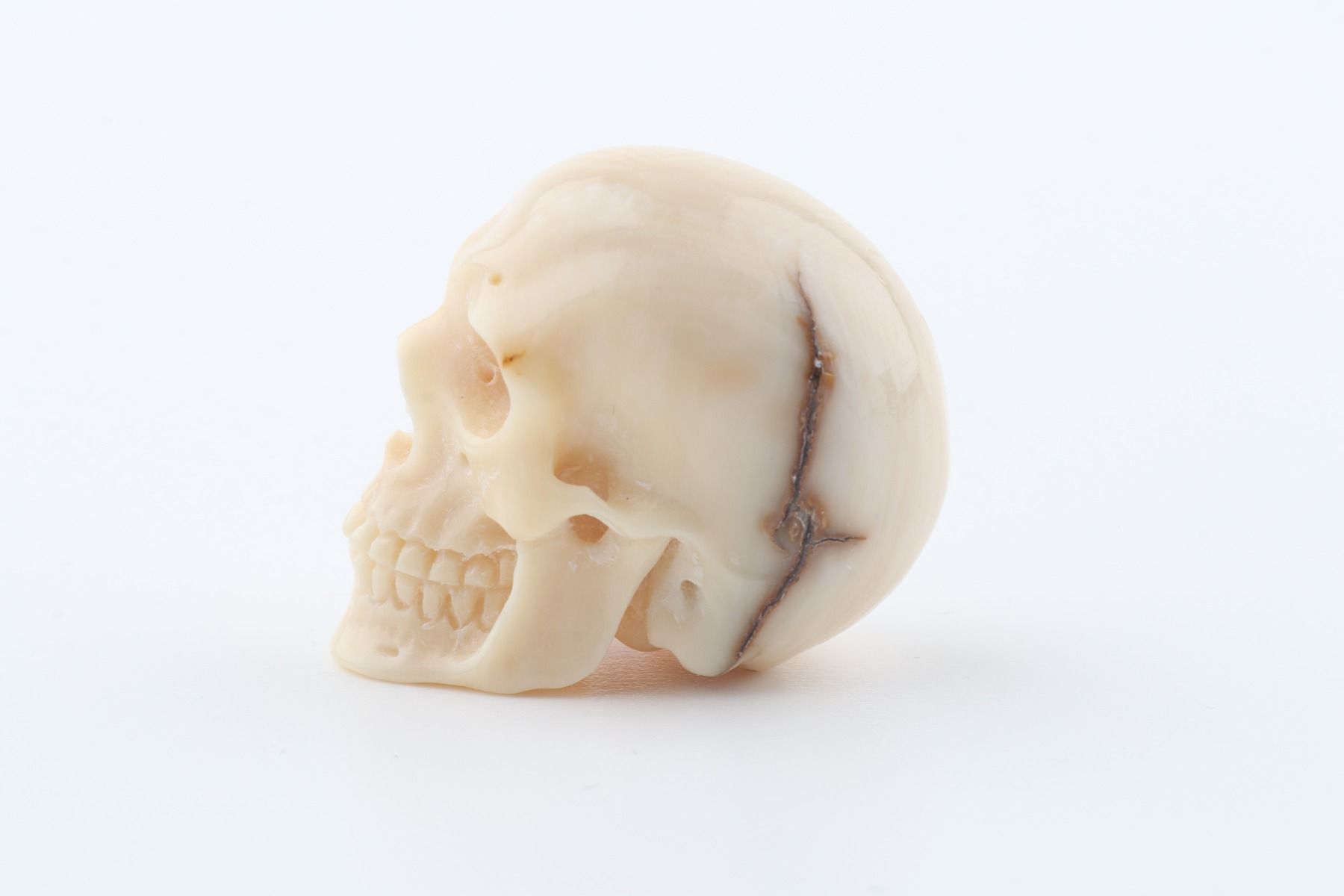 Hand-carved mammoth ivory skull