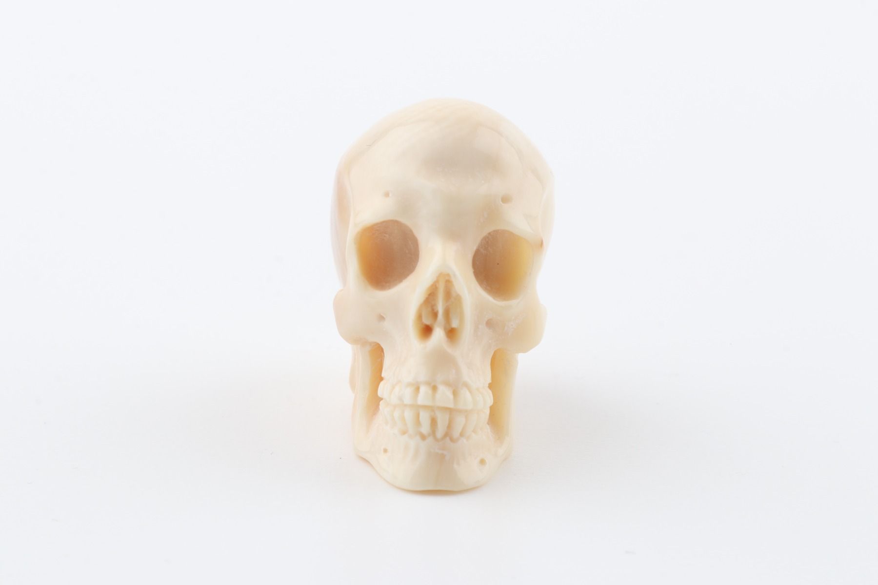 Hand-carved mammoth ivory skull