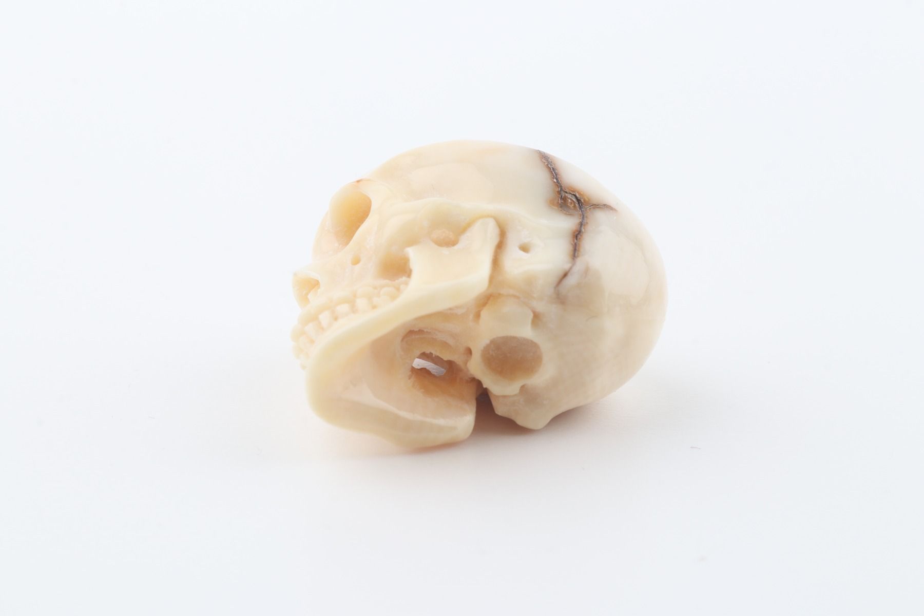 Hand-carved mammoth ivory skull