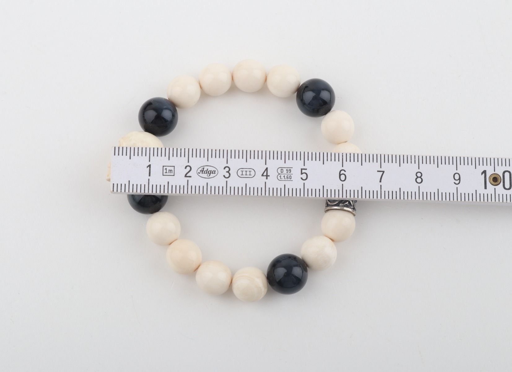 White Mammoth Skull & Flacon's Eye Bracelet