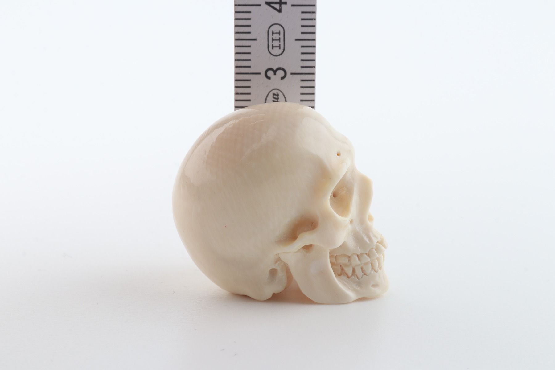 Hand carved mammoth ivory skull