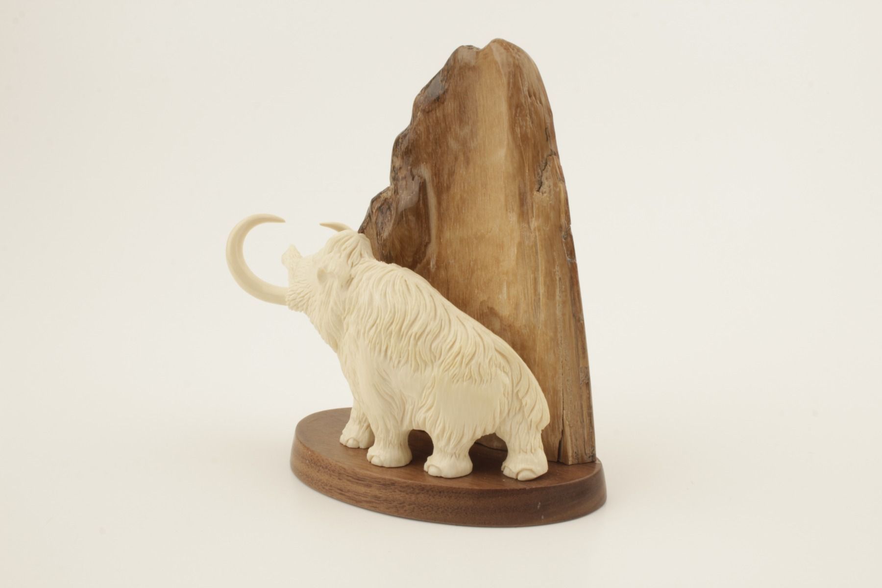 Carved woolly mammoth figurine - Arctic Antiques