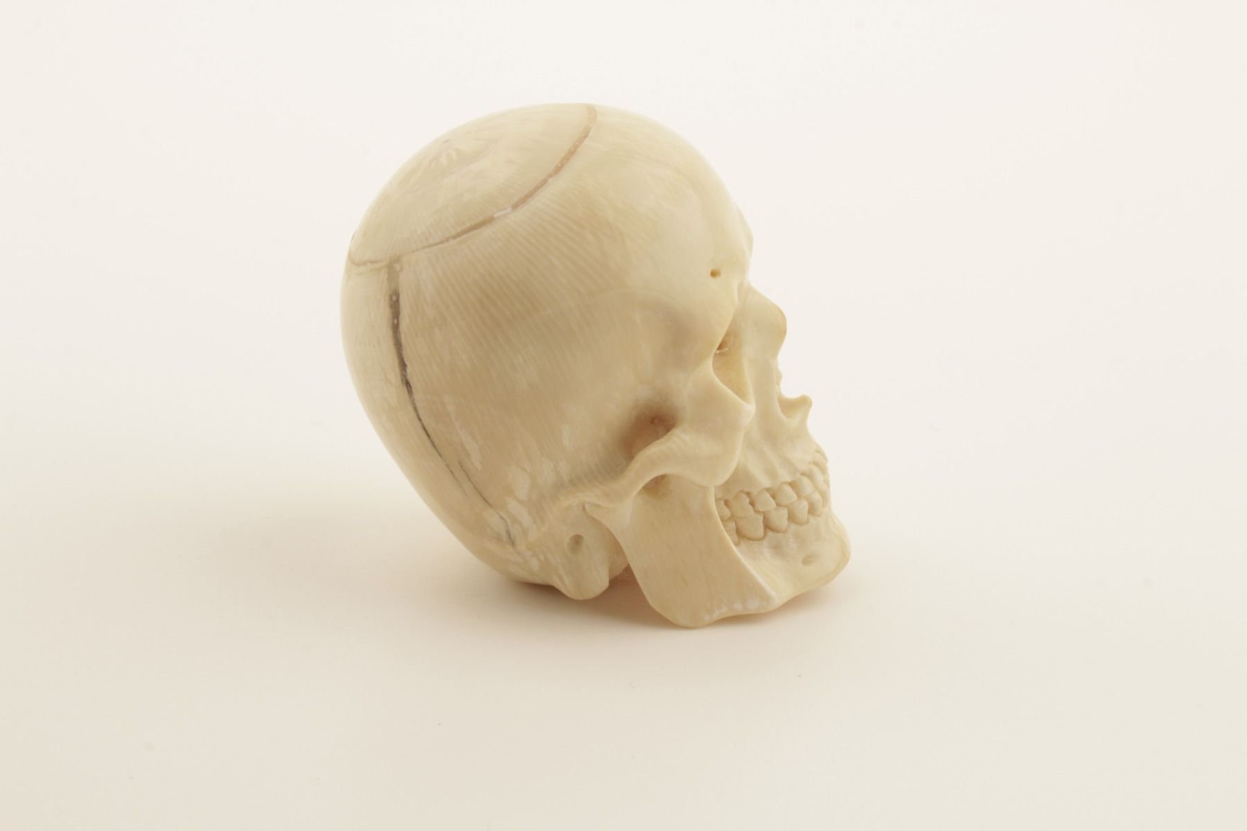 Hand-carved mammoth ivory skull