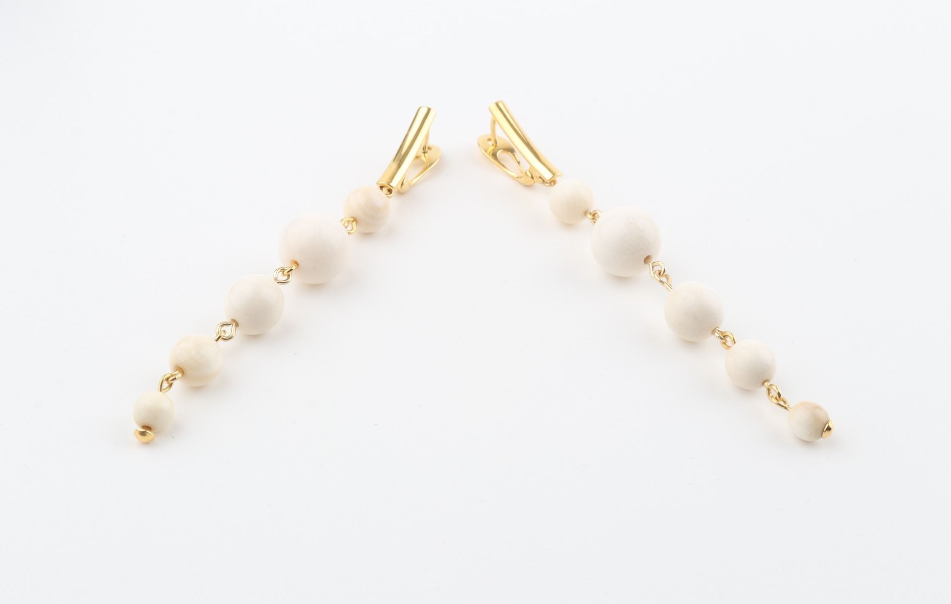 Long Graduated Mammoth Ivory Earrings